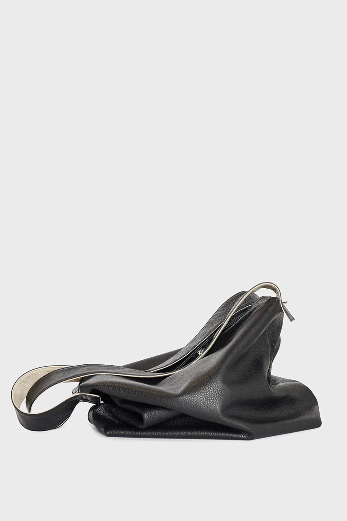 Big Day Shoulder Bag without any content inside. It features the soft slouch of the handbag when empty and yet retains structure when full.