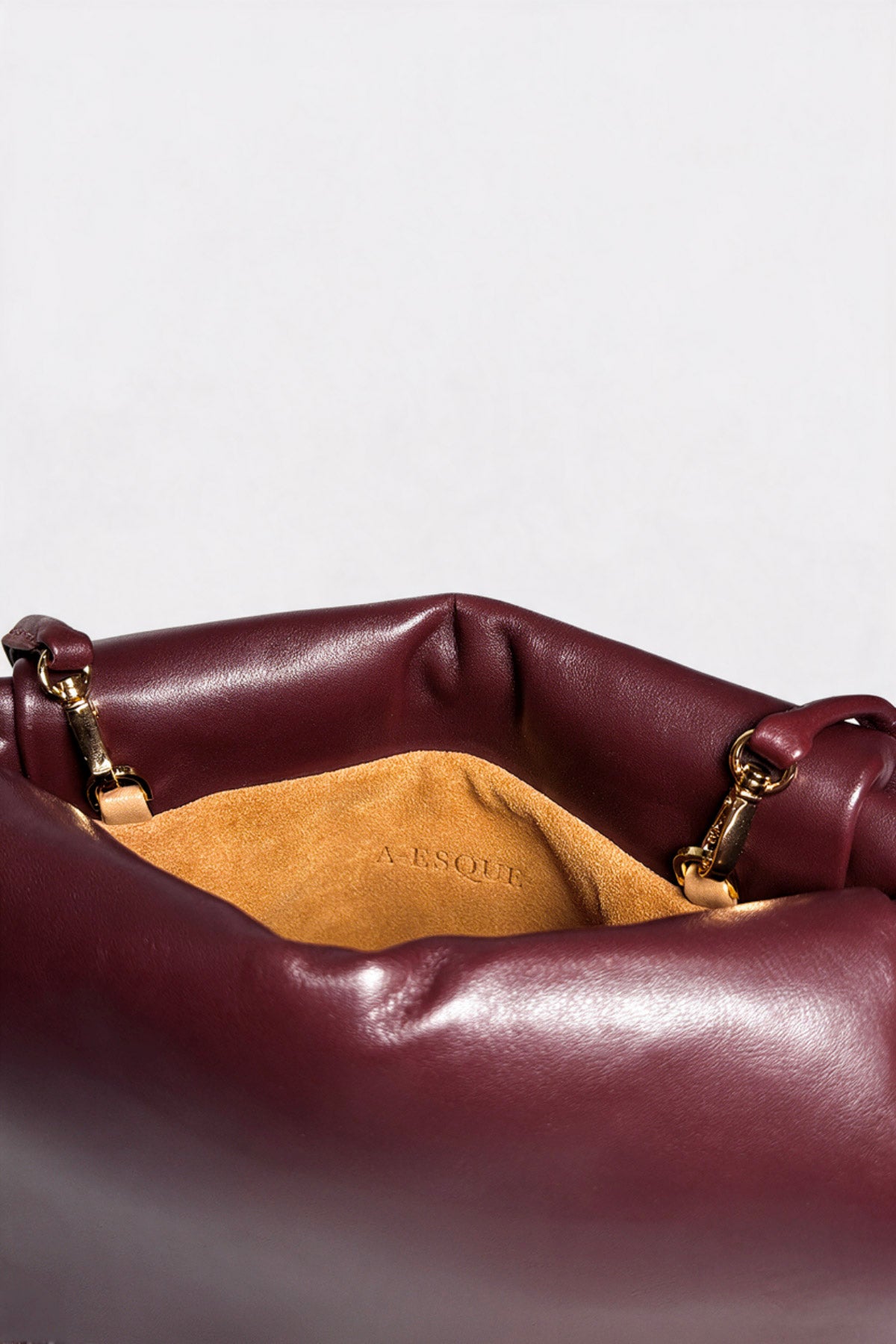 Midi Curve Clutch in Smooth Burgundy