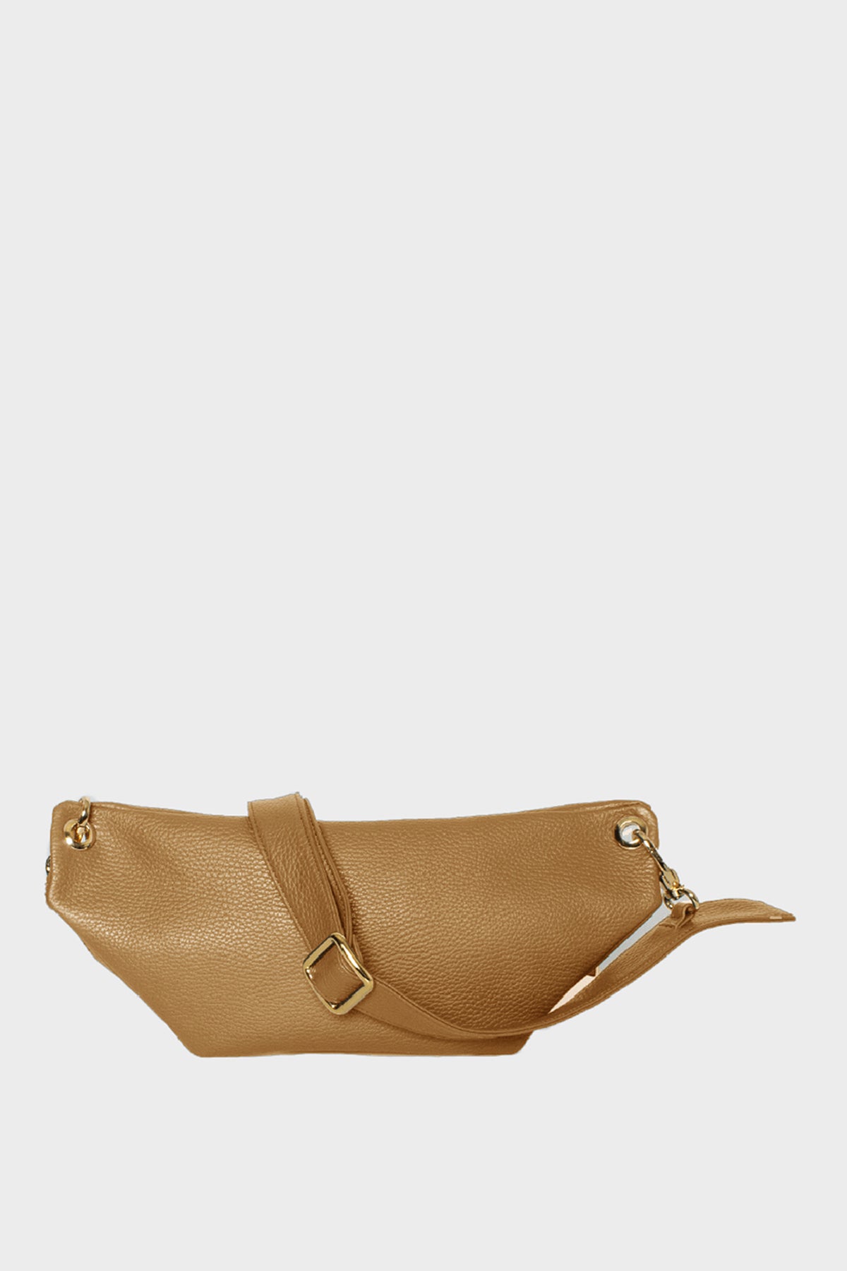 An image of the Oblong bag’s back. It shows the long detachable strap with the bag’s elongated spacious body.