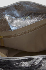 Big Day shoulder bag's interior is lined with suede leather with an interior zipped pocket in gold.