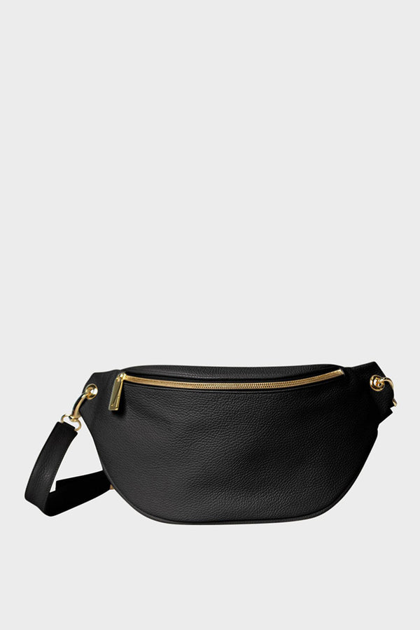 A black bum bag that also takes form as a crossbody bag. It has zip opening in gold hardware and is made of fine Italian grain leather.