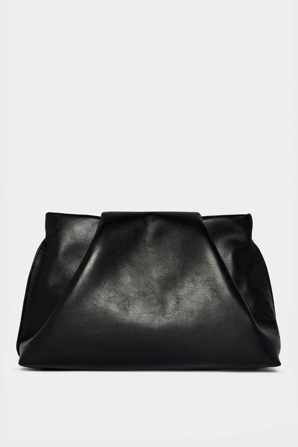 A black clutch bag made of smooth Italian leather. The handbag has removable strap and can also be worn as a shoulder bag. 