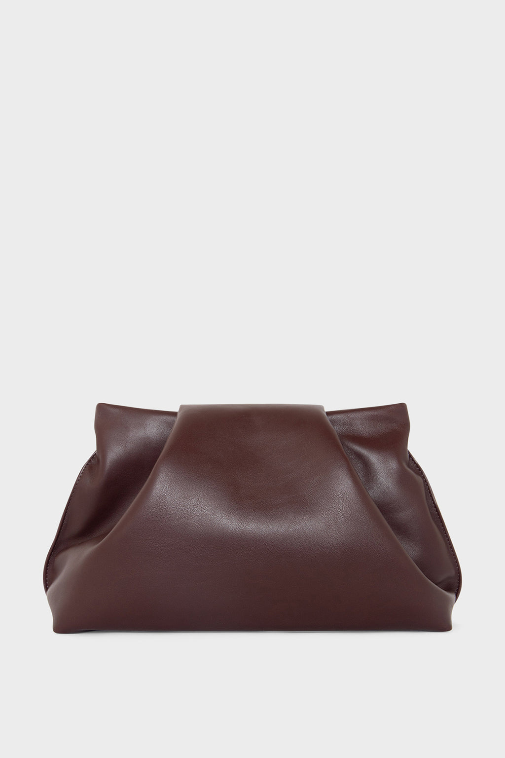 A burgundy clutch bag made of smooth Italian leather. The handbag has removable straps and can also be worn as a shoulder bag.