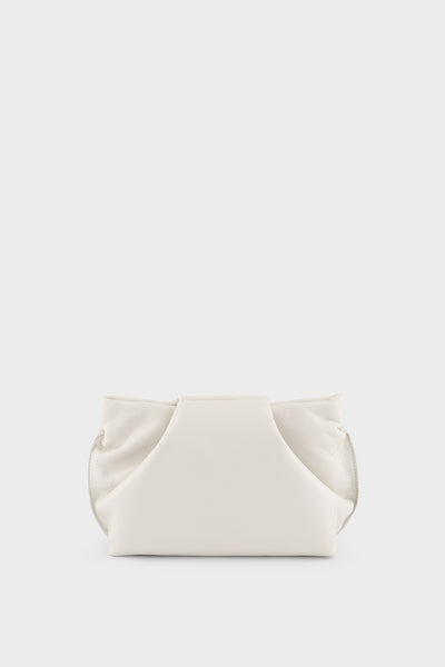 A white mini clutch bag made of smooth Italian leather. This mini bag has removable strap and can also be worn as a shoulder bag.