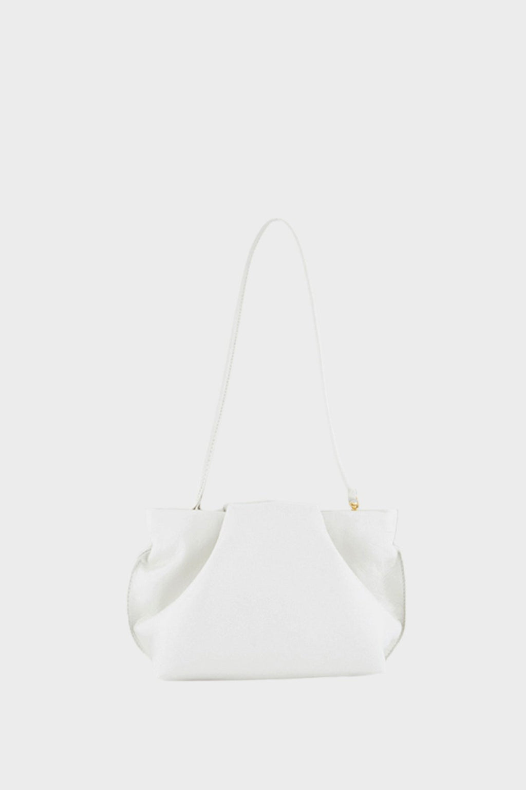 A photo of the white fold mini clutch bag with its handles up. It functions both as   as a shoulder bag and a clutch or purse.