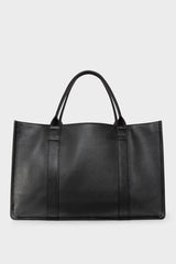 A large black tote bag with a rectangular body. It has an open top with a magnetic closure. The bag has 2 handles to be carried handheld or as a shoulder bag.