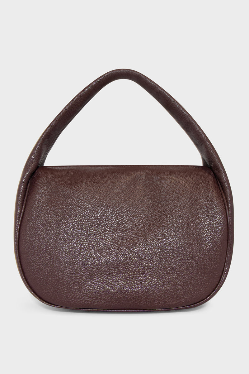 A large burgundy shoulder bag with a hobo inspired design made of fine Italian grain leather. 