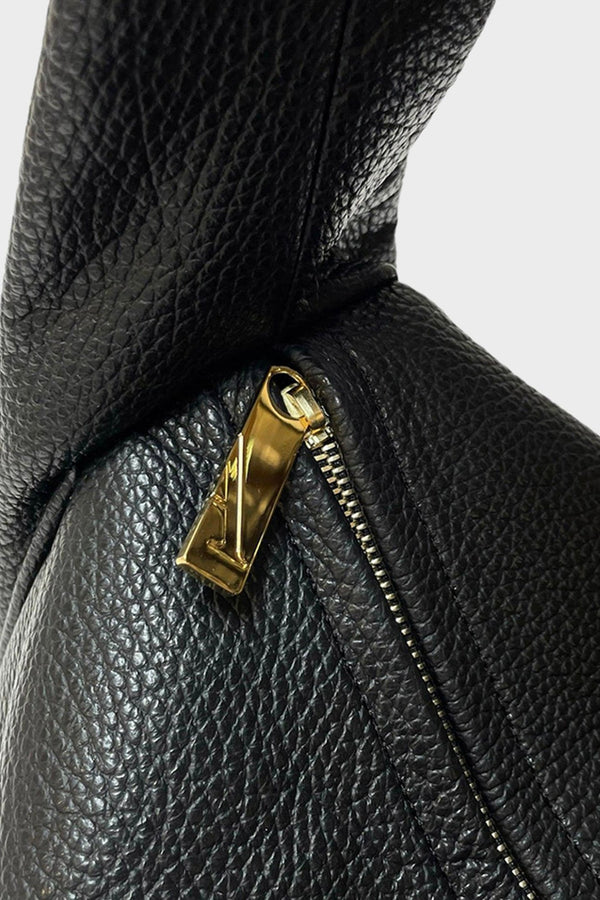 Halo Day shoulder bag in black features a gold hardware and zipper with fine hand stitching.