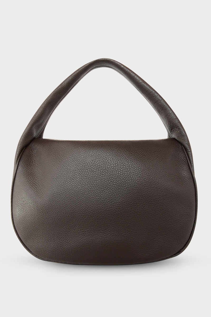 A large dark brown shoulder bag with a hobo inspired design made of fine Italian grain leather.