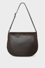 A large crossbody bag in dark brown made of fine smooth Italian leather. It has a hobo satchel design with a large yet slim body. 