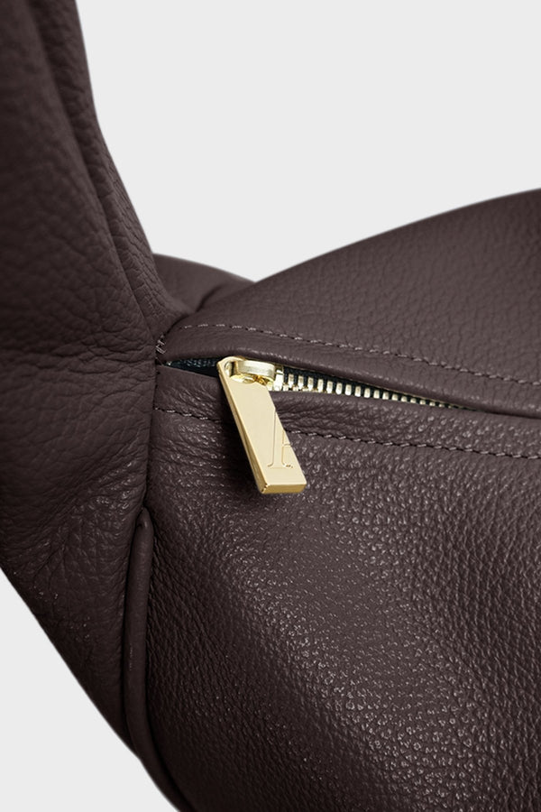 Midi Halo Day shoulder bag in dark brown features gold hardware and a zipper with fine hand stitching.