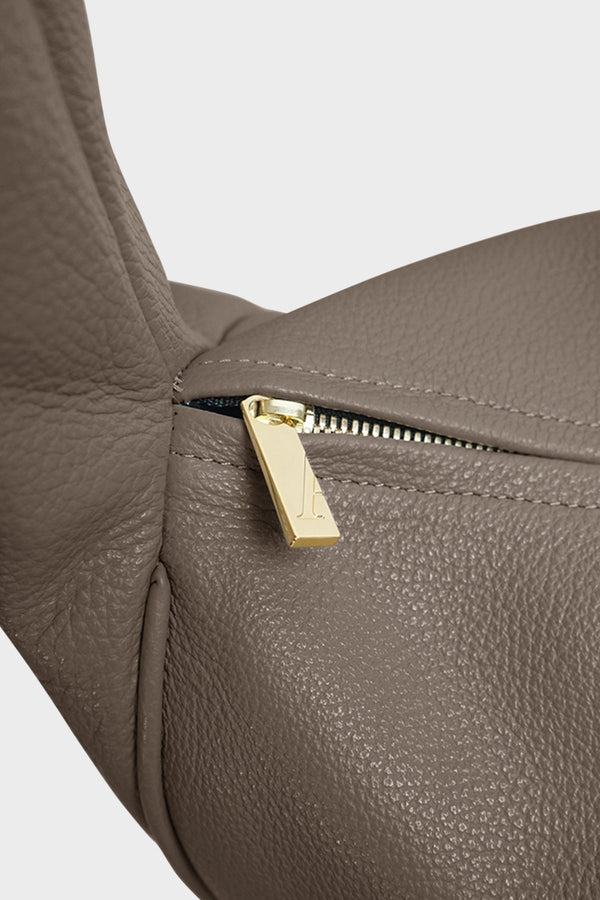 Midi Halo Day shoulder bag in grey features gold hardware and a zipper with fine hand stitching.