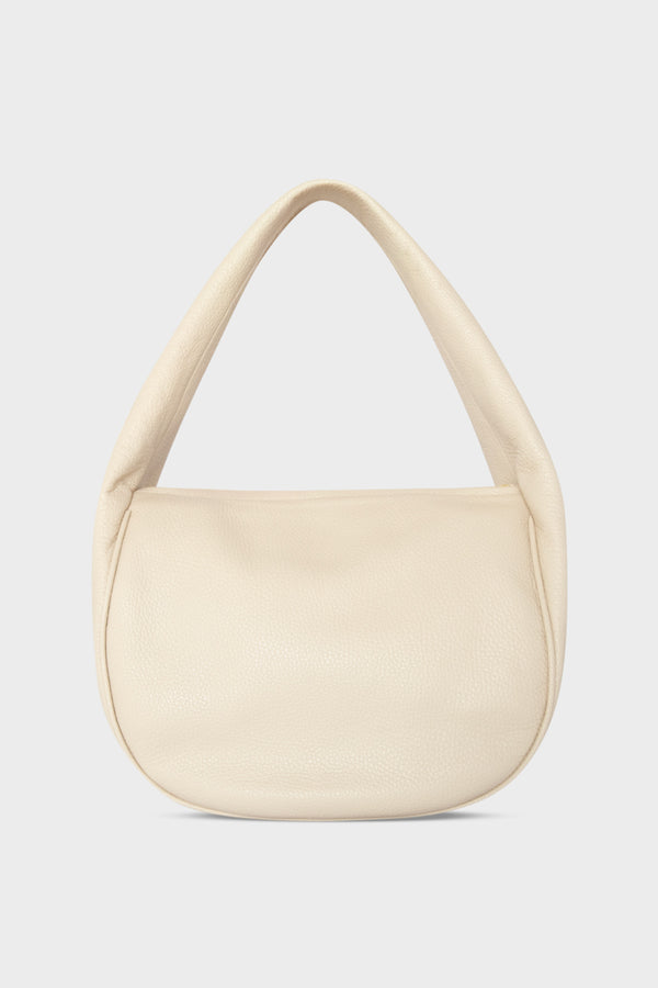 A mid-sized white shoulder bag with a hobo inspired design made of fine Italian grain leather.