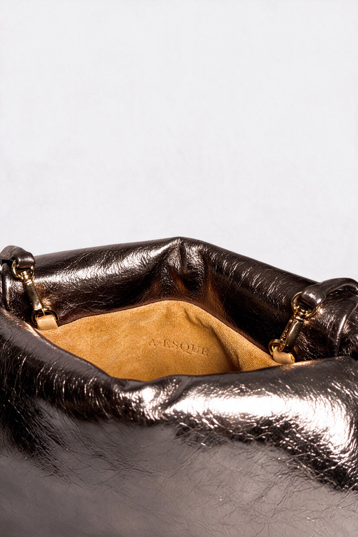 Midi Curve Clutch in Metallic Brown