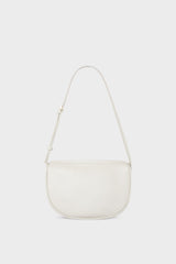 A mini shoulder bag in white made of fine smooth Italian leather. The handbag follows a hobo design with an adjustable shoulder strap.