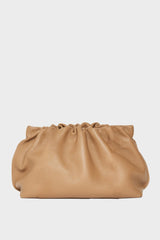 Puffa clutch can be both worn handheld or as a crossbody bag. 