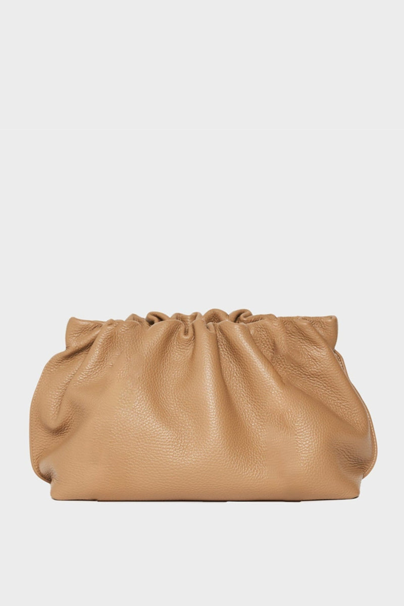 Puffa clutch can be both worn handheld or as a crossbody bag. 