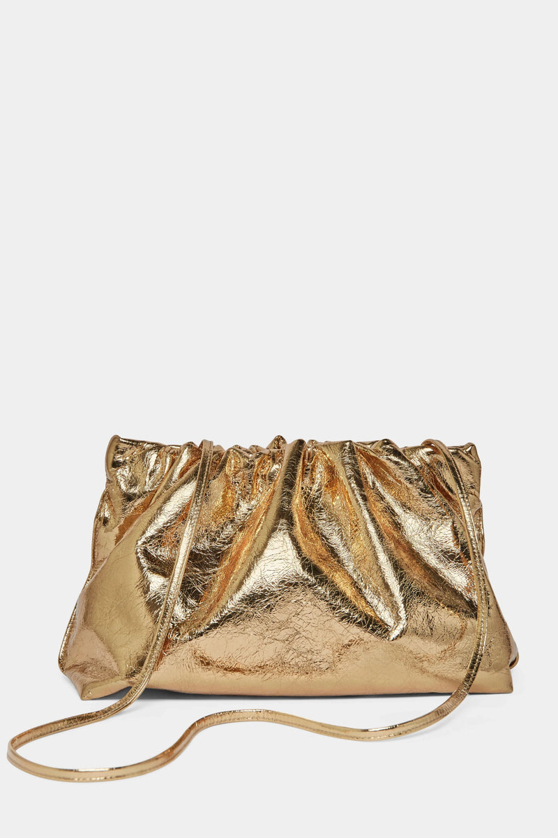 A gold clutch bag with a long removable shoulder strap. The handbag can also be worn handheld or a crossbody bag. 