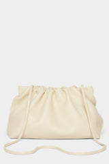 A white clutch bag with a long removable shoulder strap. The handbag can also be worn handheld or a crossbody bag. 