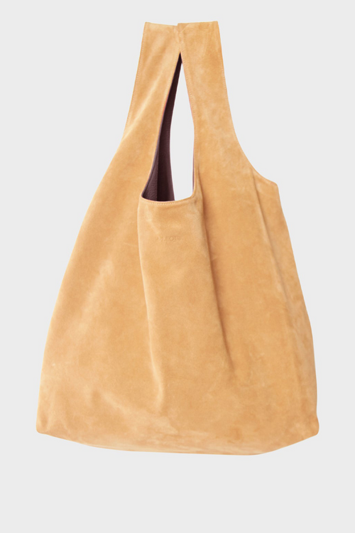 A large suede brown tote shoulder bag. The bag is suited as a work or a travel bag. It has two reversible sides in burgundy grain leather and brown suede.