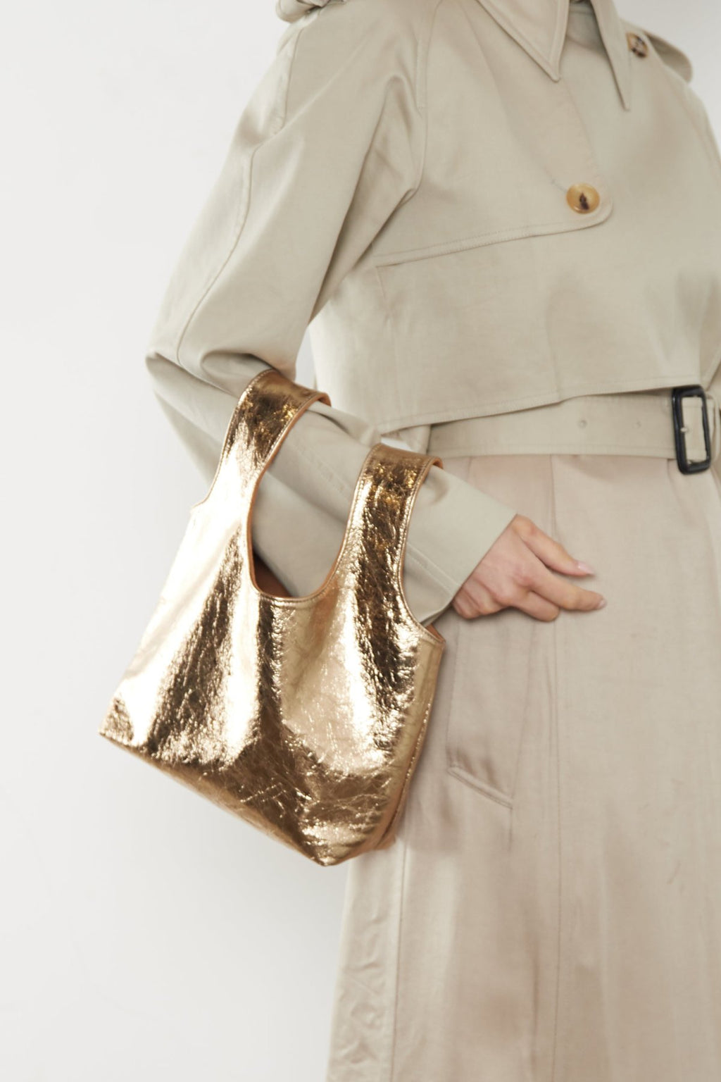 Small Reversible Sack Handbag in Metallic Gold