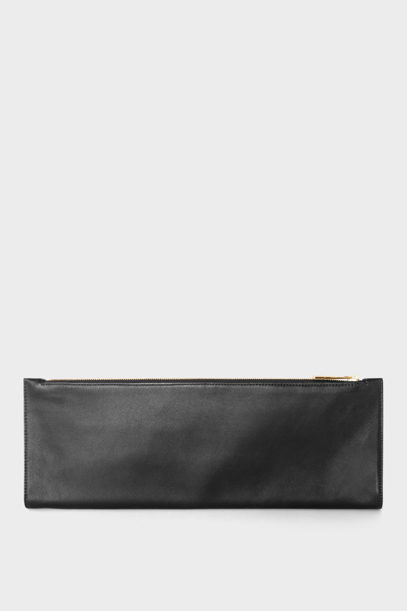 A black long clutch that is foldable. When opened to its full size, the clutch becomes a slim document leather pouch.