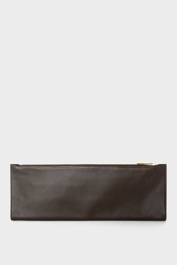 A dark brown long clutch that is foldable. When opened to its full size, the clutch becomes a slim document leather pouch.