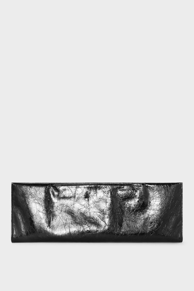 A metallic black long clutch that is foldable. When opened to its full size, the clutch becomes a slim document leather pouch.