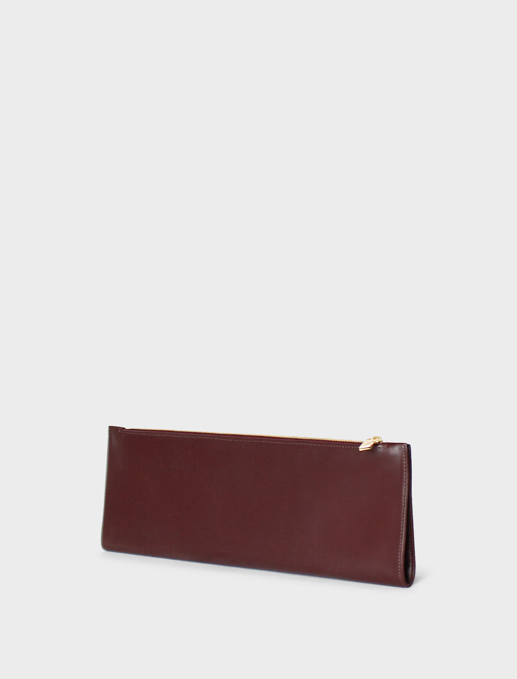 A side image of the slimline clutch pouch. The handbag is folded and looks like a long wallet. It's suited as a party clutch or a casual pouch or purse.