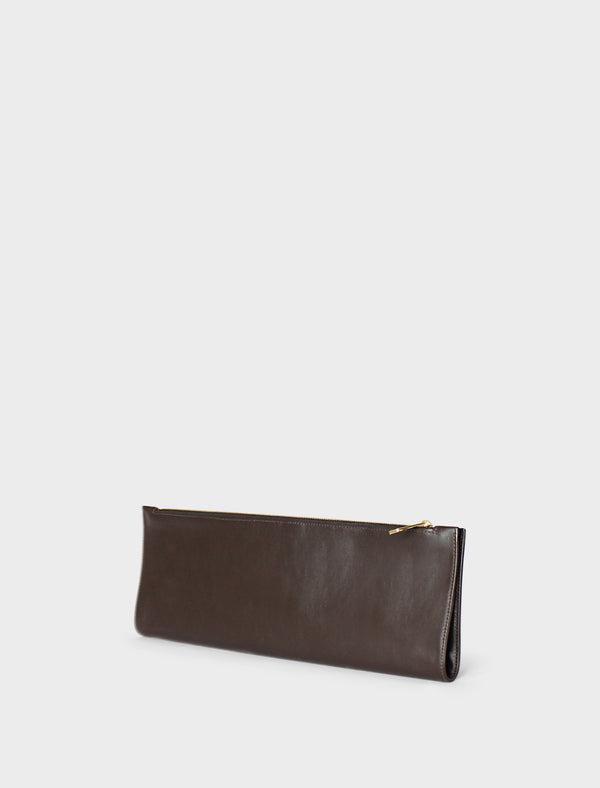 A side image of the slimline clutch pouch. The handbag is folded and looks like a long wallet. It's suited as a party clutch or a casual pouch or purse.